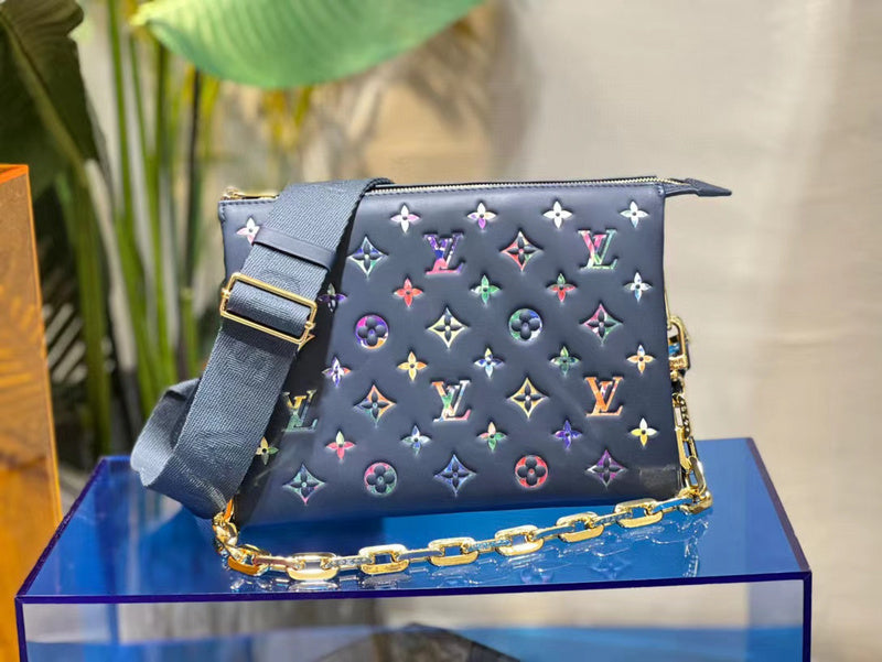 Side profile of structured signature women's handbag – women's statement bag