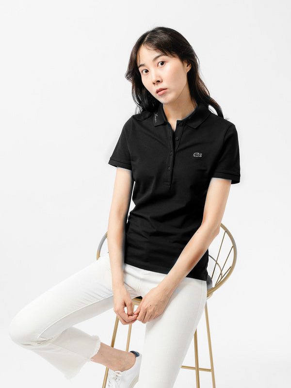 Full styled look of Lacoste luxury clothing with signature branding