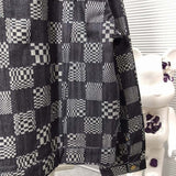 Back view of Louis Vuitton luxury clothing with contemporary cut