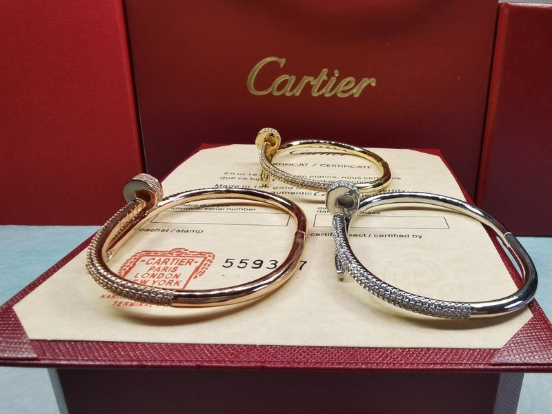 Close-up detail view of Cartier unisex jewelry piece