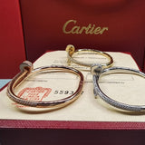 Close-up detail view of Cartier unisex jewelry piece