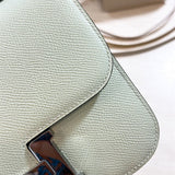  clean-lined shoulder bag styled with outfit