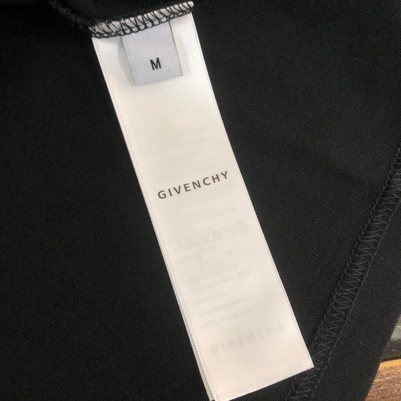 Side profile of Givenchy luxury clothing with relaxed-fit cut