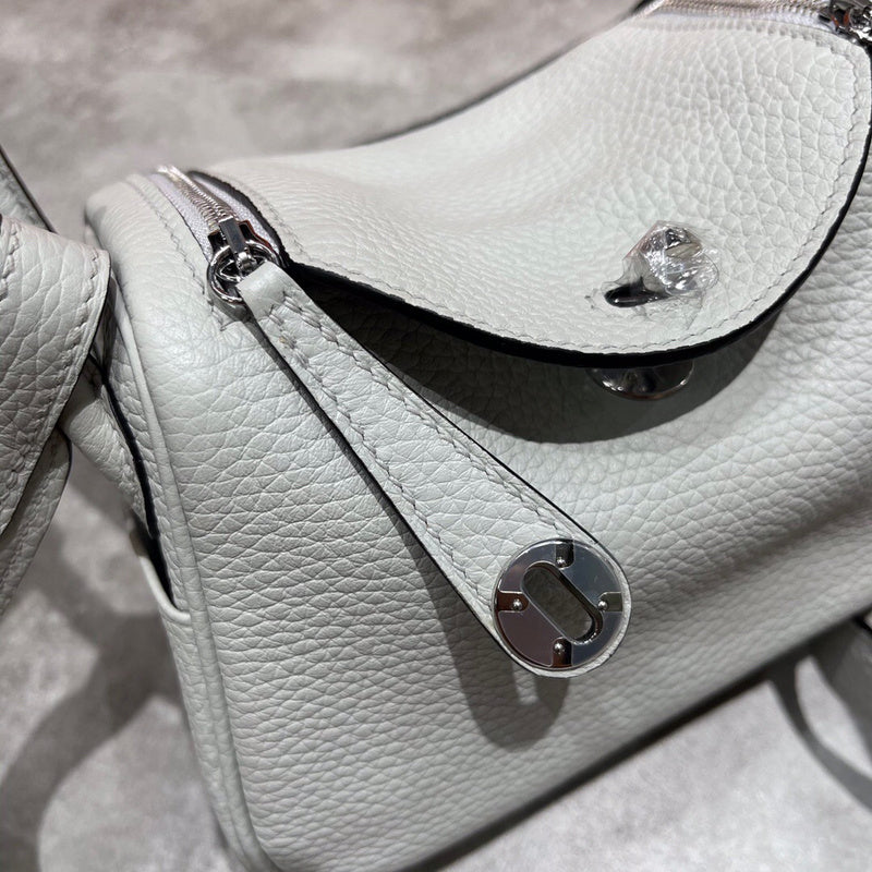 Side view of clean-lined structured handbag