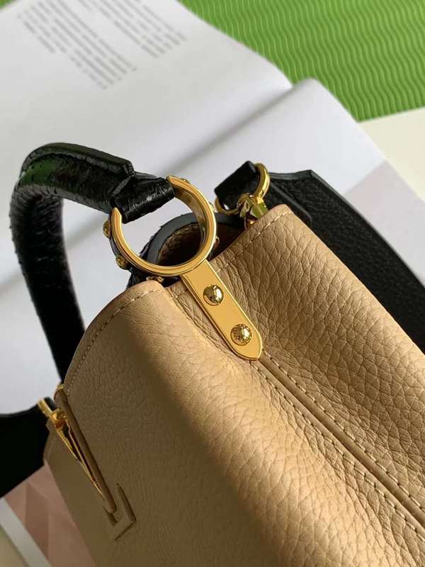 Handle and strap detail of signature modern women's handbag – women's luxury handbag