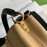 Handle and strap detail of signature modern women's handbag – women's luxury handbag