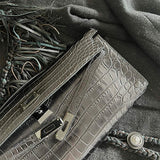 Close-up detail of poised bag design