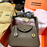 Side view of elegant structured handbag