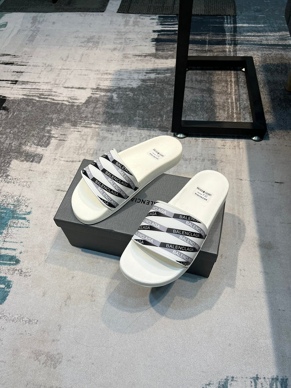 Balenciaga Black Flat Thong Sandals - Close-Up Texture View