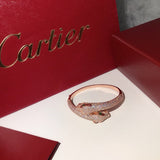 Close-up detail view of Cartier unisex jewelry piece