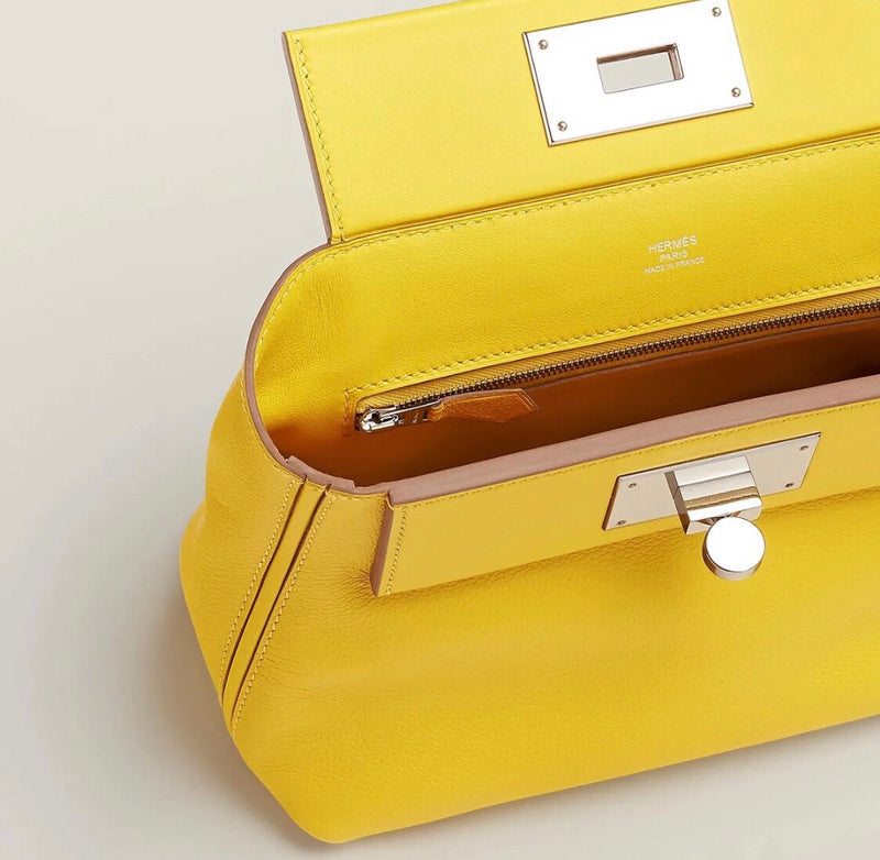Side view of tailored structured handbag