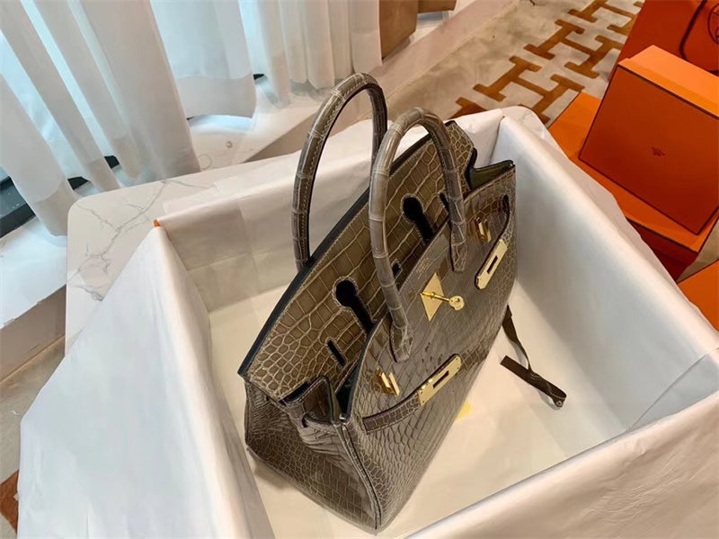 Side view of classic structured handbag