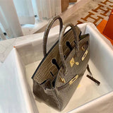 Side view of classic structured handbag