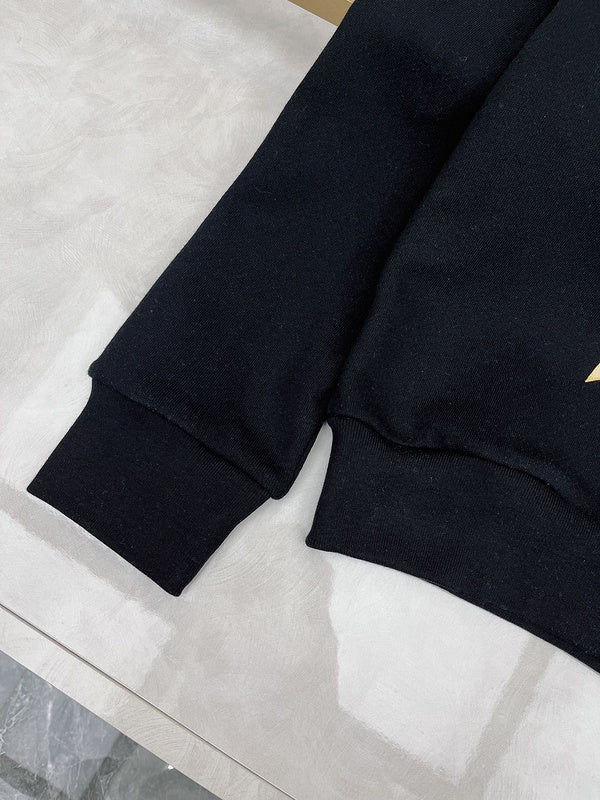 Flat lay presentation of Gucci luxury clothing with logo-detail design