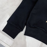 Flat lay presentation of Gucci luxury clothing with logo-detail design