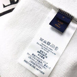 Close-up detail shot of Louis Vuitton luxury clothing with streetwear-inspired cut