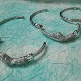 Front view of Cartier unisex jewelry piece