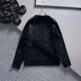 Close-up detail shot of Louis Vuitton luxury clothing with logo-detail design