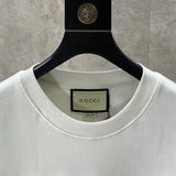 Side profile of Gucci luxury clothing with runway-inspired design
