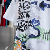 Flat lay presentation of Louis Vuitton cotton t-shirt with signature branding