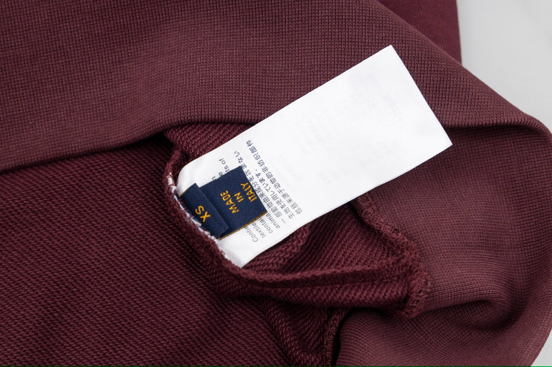 Close-up detail shot of Louis Vuitton luxury clothing with contemporary cut