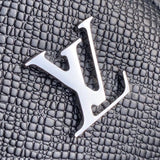 Side profile of sleek elevated women's handbag – women's designer-style accessory