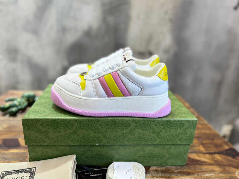 Side profile of Gucci crisp white sneakers heritage-inspired look
