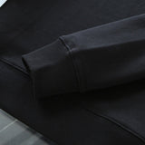 Side profile of Louis Vuitton luxury clothing with tailored silhouette