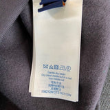 Back view of Louis Vuitton luxury clothing with everyday silhouette