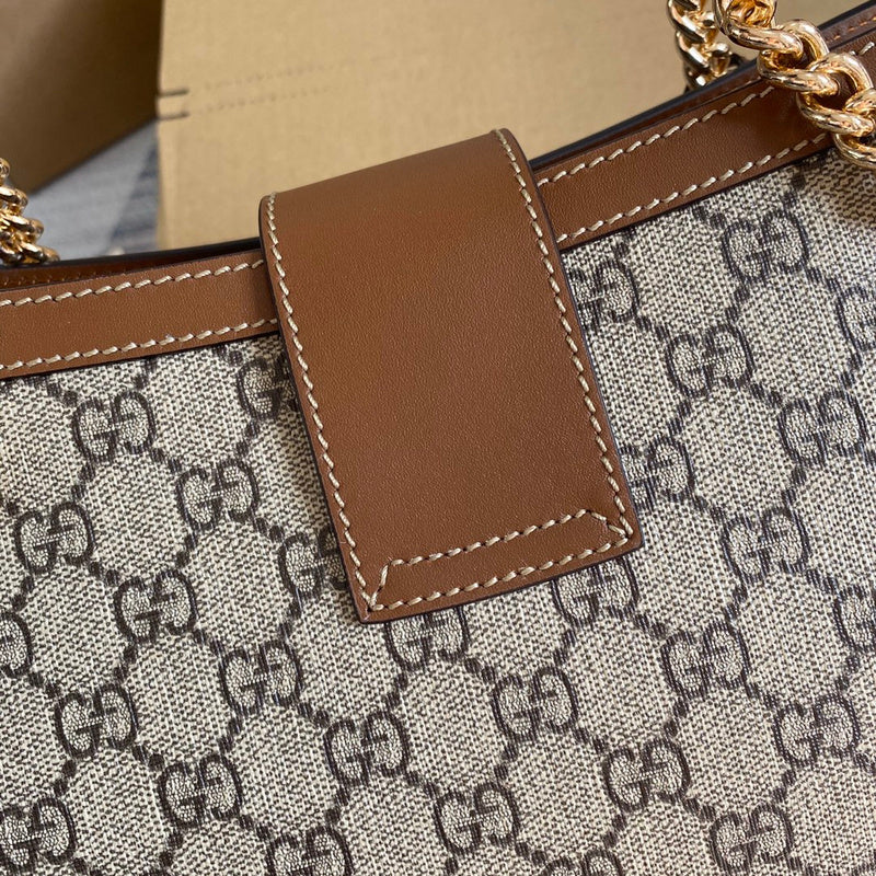 Handle and strap detail of premium modern women's handbag – women's statement bag