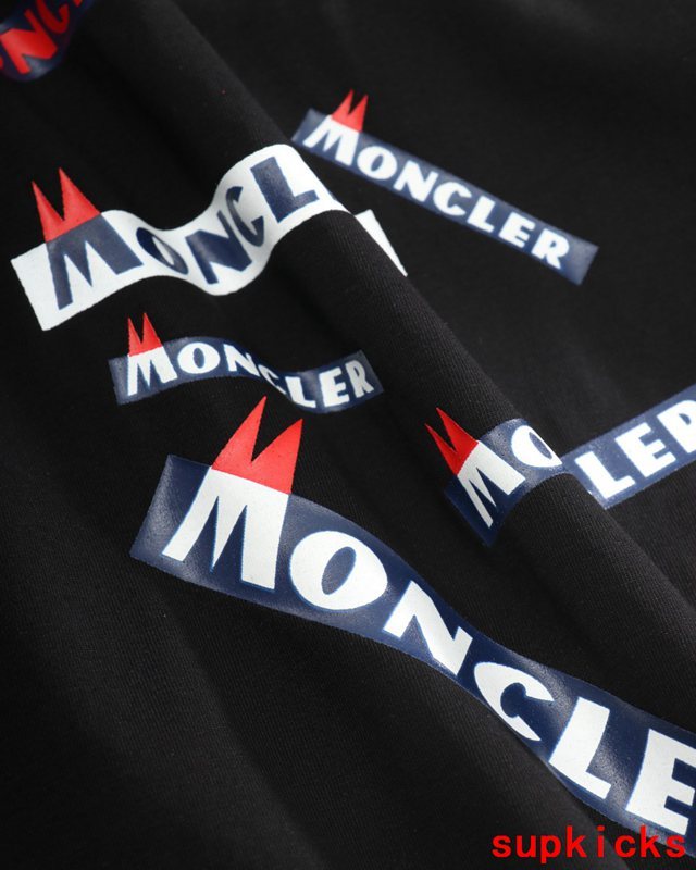 Front view of Moncler luxury clothing with tailored silhouette