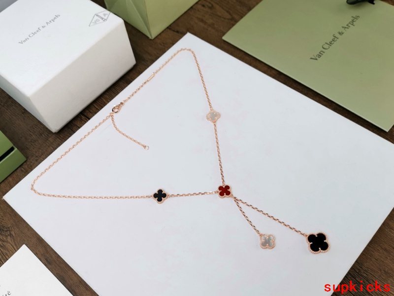 Lifestyle view of Van Cleef & Arpels unisex jewelry piece