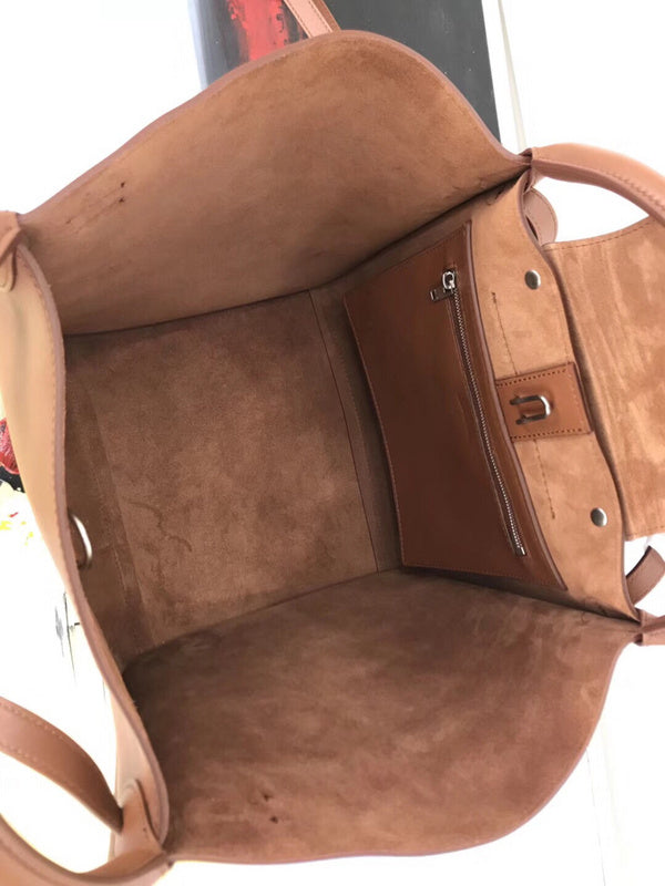 Top view of modern signature women's handbag – women's designer-style accessory
