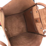 Top view of modern signature women's handbag – women's designer-style accessory
