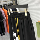 Front view of Rhude luxury clothing with logo-detail design