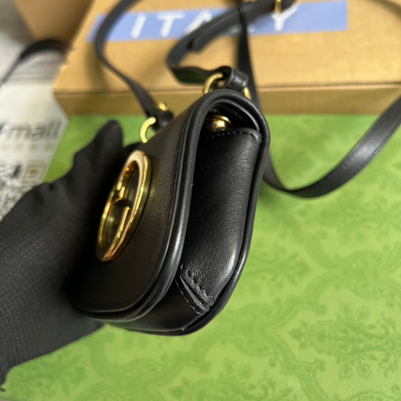 Styled lifestyle shot of sleek everyday-luxe women's handbag – women's statement bag