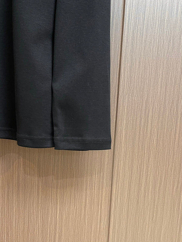 Back view of Louis Vuitton luxury clothing with tailored silhouette