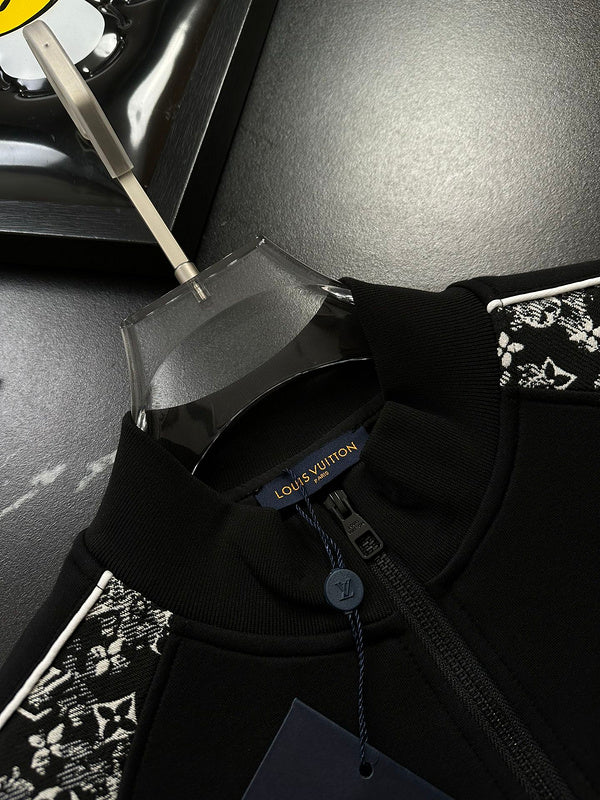 Close-up detail shot of Louis Vuitton luxury clothing with label-forward styling
