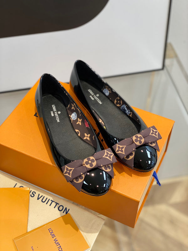 Louis Vuitton Red Slip-On Sneakers - Close-Up Texture View