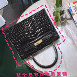 Sculpted handbag styled for everyday wear