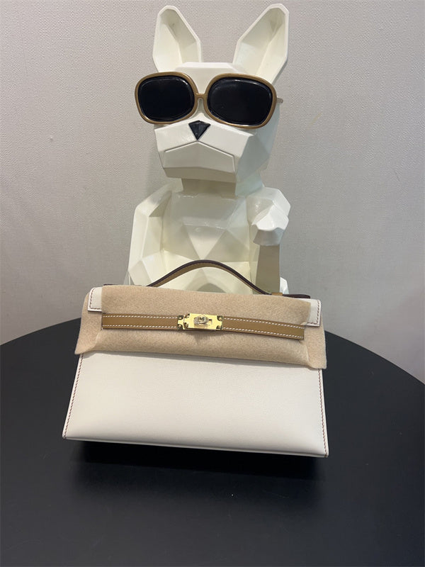  structured top-handle bag styled with outfit