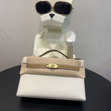  structured top-handle bag styled with outfit