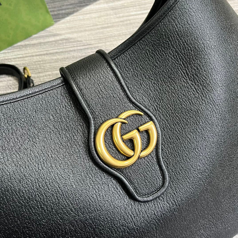 Handle and strap detail of everyday-luxe refined women's handbag – women's statement bag