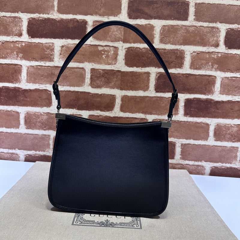 Side profile of statement refined women's handbag – women's luxury handbag