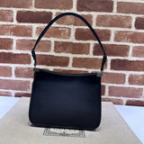 Side profile of statement refined women's handbag – women's luxury handbag