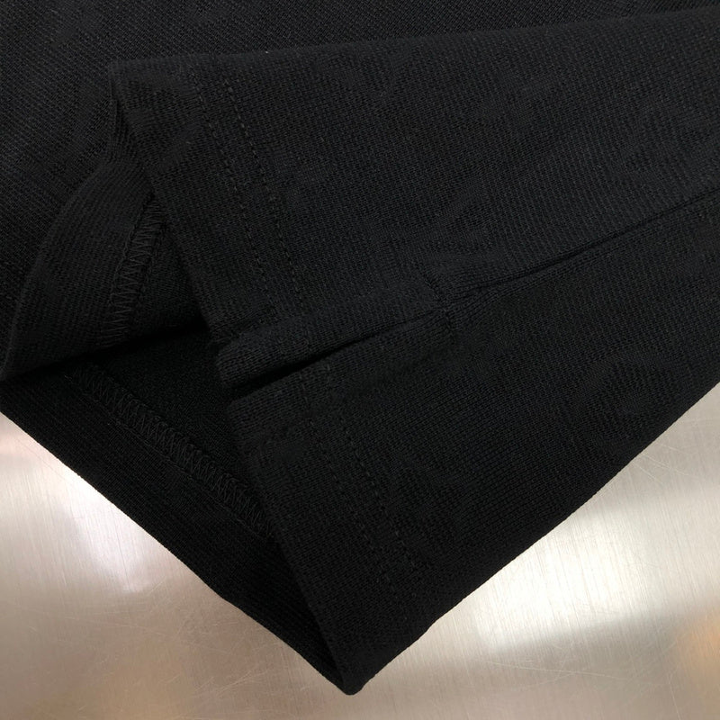 Full styled look of Louis Vuitton cotton t-shirt with label-forward styling