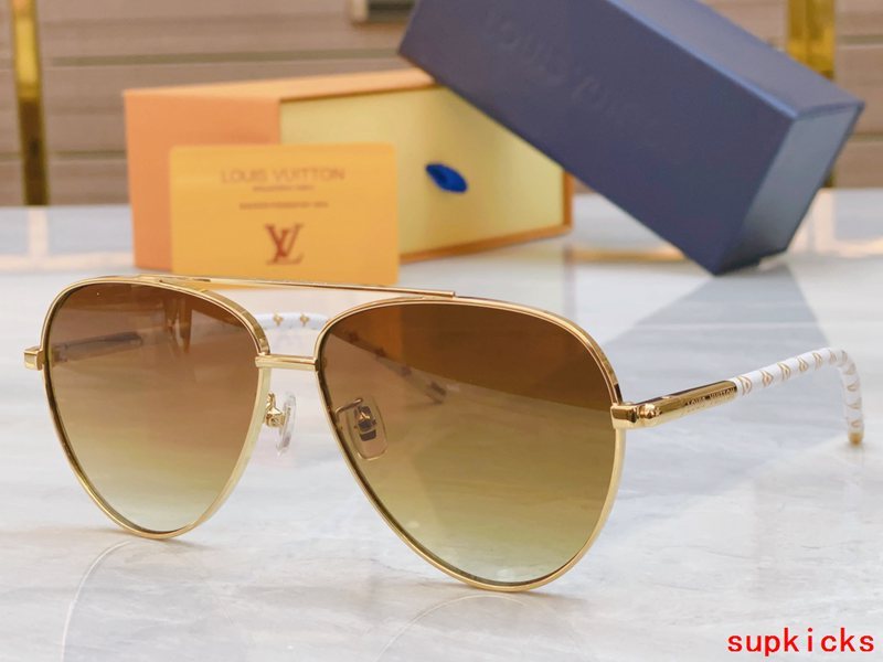 Close-up detail view of Louis Vuitton unisex sunglasses