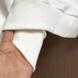 Close-up detail shot of Louis Vuitton luxury clothing with tailored silhouette