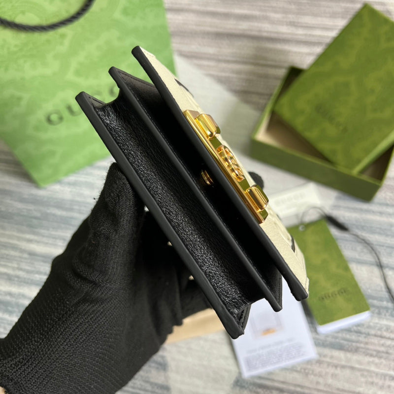 Styled lifestyle shot of modern sleek women's handbag – women's luxury accessory