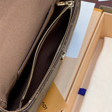  crossbody bag close-up of hardware and finish